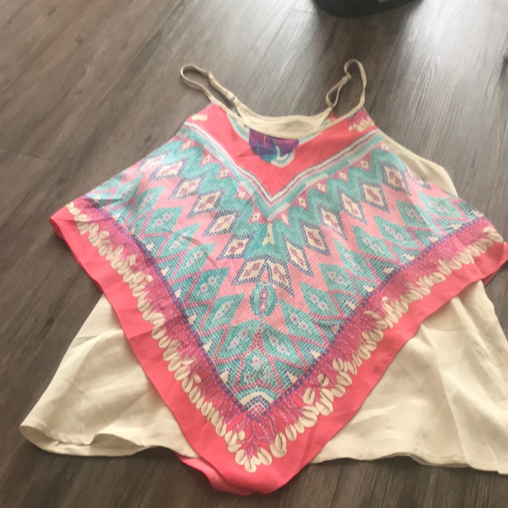 Silk top with printed overlay.